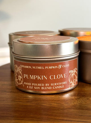 Pumpkin clove soy blend Candle in a travel tin